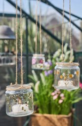 Ljuslykta i glas med blommönster från Speedtsberg